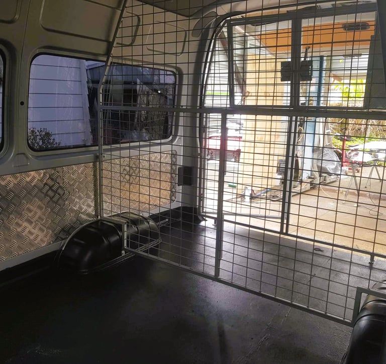 Transport van interior with secure crates
